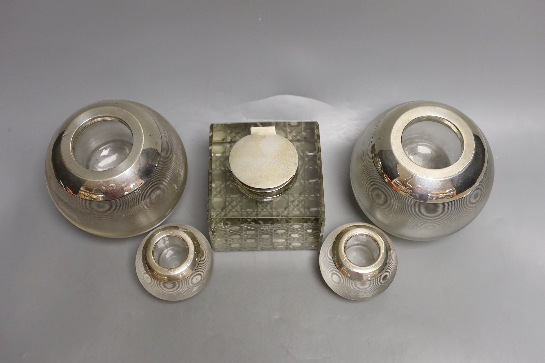 Two pairs of early to mid 20th century silver mounted ribbed glass match tidies, largest height 11cm and a silver mounted glass inkwell.